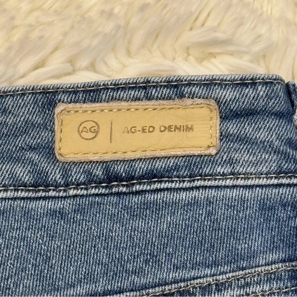AG Adriano Goldschmied Light Wash Bootcut Jeans w/ Raw Hem